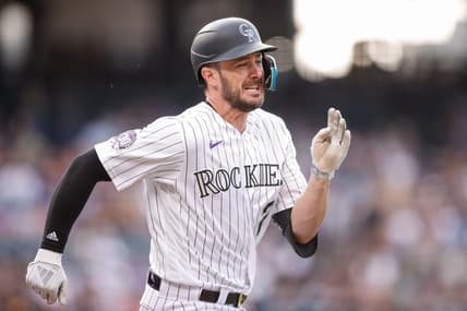 Jun 30, 2023; Denver, Colorado, USA; Colorado Rockies right fielder Kris Bryant (23) runs to first on a fielders choice RBI in the first inning against the Detroit Tigers at Coors Field. Mandatory Credit: Isaiah J. Downing-USA TODAY Sports