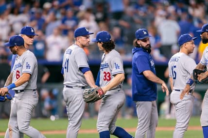 Jun 30, 2023; Kansas City, Missouri, USA; Los Angeles Dodgers congratulate one another after winning the game against the Kansas City Royals at Kauffman Stadium. Mandatory Credit: William Purnell-USA TODAY Sports