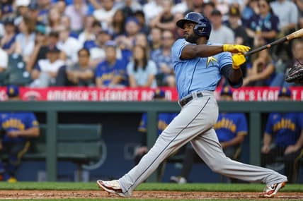 Jun 30, 2023; Seattle, Washington, USA; Tampa Bay Rays left fielder Randy Arozarena (56) hits a two-run home run against the Seattle Mariners during the fourth inning at T-Mobile Park. Mandatory Credit: Joe Nicholson-USA TODAY Sports