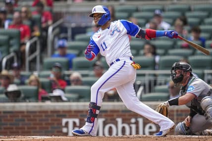 Jul 1, 2023; Cumberland, Georgia, USA; Atlanta Braves shortstop Orlando Arcia (11) doubles to drive in a run against the Miami Marlins during the first inning at Truist Park. Mandatory Credit: Dale Zanine-USA TODAY Sports