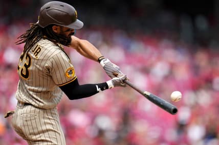 San Diego Padres right fielder Fernando Tatis Jr. (23) hits a sacrifice fly in the eighth inning during a baseball game between the San Diego Padres and the Cincinnati Reds, Saturday, July 1, 2023, at Great American Ball Park in Cincinnati.
