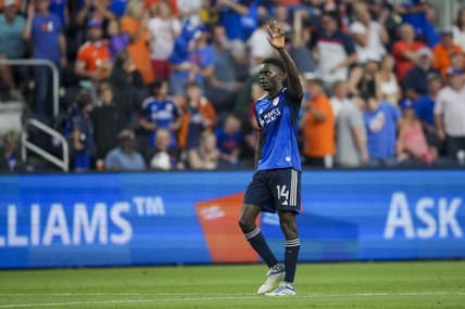 Jul 1, 2023; Cincinnati, Ohio, USA; FC Cincinnati forward Dominique Badji (14) celebrates after scoring a goal against the New England Revolution in the second half at TQL Stadium. Mandatory Credit: Aaron Doster-USA TODAY Sports