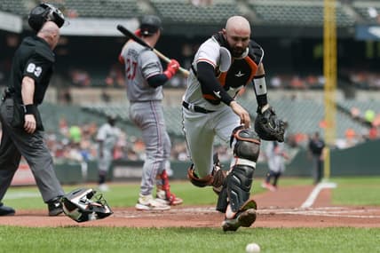 Jul 2, 2023; Baltimore, Maryland, USA;  Baltimore Orioles catcher Anthony Bemboom (37) chases down a pass ball during the first inning against the Minnesota Twins at Oriole Park at Camden Yards. Mandatory Credit: Tommy Gilligan-USA TODAY Sports