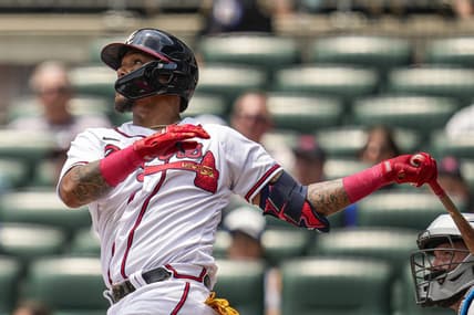 Jul 2, 2023; Cumberland, Georgia, USA; Atlanta Braves shortstop Orlando Arcia (11) watches the ball after hitting a home run against the Miami Marlins during the second inning at Truist Park. Mandatory Credit: Dale Zanine-USA TODAY Sports