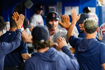 Jul 2, 2023; Toronto, Ontario, CAN;  Boston Red Sox center fielder Jarren Duran (16) celebrates after scoring against the Toronto Blue Jays during the third inning at Rogers Centre. Mandatory Credit: Kevin Sousa-USA TODAY Sports
