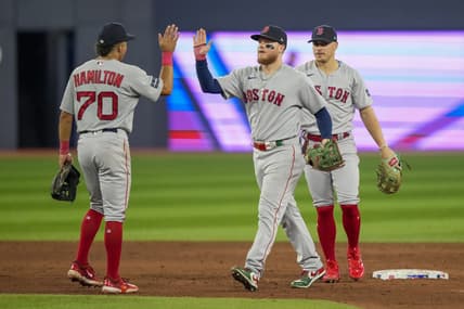 Jul 2, 2023; Toronto, Ontario, CAN; Boston Red Sox right fielder Alex Verdugo (99) and shortstop David Hamilton (70) celebrate after defeating the Toronto Blue Jays at Rogers Centre. Mandatory Credit: Kevin Sousa-USA TODAY Sports