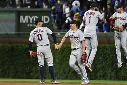Jul 2, 2023; Chicago, Illinois, USA;  Cleveland Guardians left fielder Steven Kwan (38), right, celebrates with shortstop Amed Rosario (1) after beating the Chicago Cubs at Wrigley Field. Mandatory Credit: Matt Marton-USA TODAY Sports