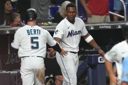 Jul 3, 2023; Miami, Florida, USA;  Miami Marlins shortstop Jon Berti (5) is congratulated by designated hitter Jorge Soler (12) after scoring a run in the seventh inning against the St. Louis Cardinals at loanDepot Park. Mandatory Credit: Jim Rassol-USA TODAY Sports