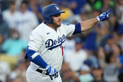 Jul 3, 2023; Los Angeles, California, USA; Los Angeles Dodgers third baseman Max Muncy (13) reacts after hitting a solo home run in the second inning against the Pittsburgh Pirates at Dodger Stadium. Mandatory Credit: Kirby Lee-USA TODAY Sports