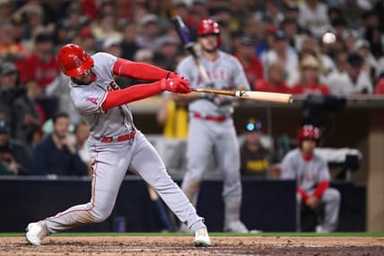 Jul 3, 2023; San Diego, California, USA; Los Angeles Angels left fielder Taylor Ward (3) hits an RBI double against the San Diego Padres during the sixth inning at Petco Park. Mandatory Credit: Orlando Ramirez-USA TODAY Sports