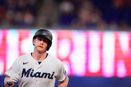 Jul 4, 2023; Miami, Florida, USA; Miami Marlins first baseman Garrett Cooper (26) runs the bases after hitting a home run against the St. Louis Cardinals during the third inning at loanDepot Park. Mandatory Credit: Rich Storry-USA TODAY Sports