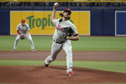 Jul 4, 2023; St. Petersburg, Florida, USA; Philadelphia Phillies starting pitcher Aaron Nola (27) throws a pitch against the Tampa Bay Rays during the first inning at Tropicana Field. Mandatory Credit: Dave Nelson-USA TODAY Sports