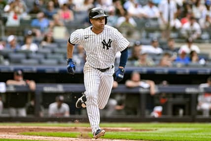 Jul 4, 2023; Bronx, New York, USA; New York Yankees center fielder Isiah Kiner-Falefa (12) runs to first base after hitting a double against the Baltimore Orioles during the eighth inning at Yankee Stadium. Mandatory Credit: John Jones-USA TODAY Sports