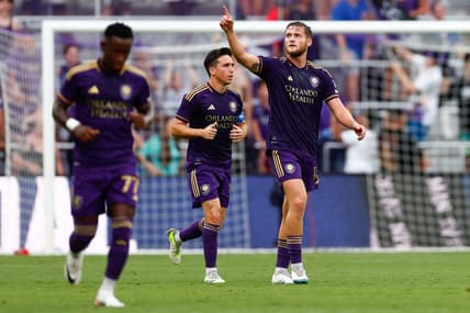 Jul 4, 2023; Orlando, Florida, USA; Orlando City forward Duncan McGuire (13) reacts after scoring a goal against the Toronto FC during the first half at Exploria Stadium. Mandatory Credit: Douglas DeFelice-USA TODAY Sports