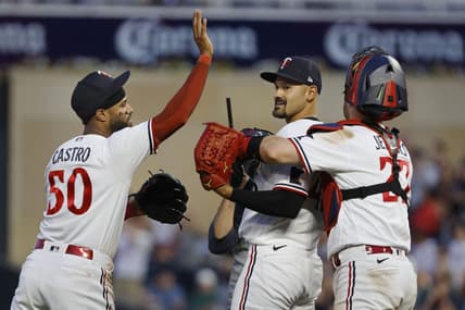 Jul 5, 2023; Minneapolis, Minnesota, USA; Minnesota Twins starting pitcher Pablo Lopez (49) celebrates his shutout win over the Kansas City Royals with catcher Ryan Jeffers (27) and center fielder Willi Castro (50) after the ninth inning at Target Field. Mandatory Credit: Bruce Kluckhohn-USA TODAY Sports