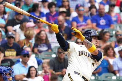 Jul 6, 2023; Milwaukee, Wisconsin, USA; Milwaukee Brewers catcher Victor Caratini (7) hits a home run during the bottom of the eighth inning against the Chicago Cubs at American Family Field. Mandatory Credit: Kayla Wolf-USA TODAY Sports