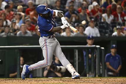Jul 7, 2023; Washington, District of Columbia, USA; Texas Rangers right fielder Adolis Garcia (53) hits a solo home run against the Washington Nationals during the seventh inning at Nationals Park. Mandatory Credit: Brad Mills-USA TODAY Sports