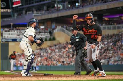 Jul 7, 2023; Minneapolis, Minnesota, USA; Baltimore Orioles third baseman Ramon Urias (29) celebrates scoring in the tenth inning against the Minnesota Twins at Target Field. Mandatory Credit: Matt Blewett-USA TODAY Sports
