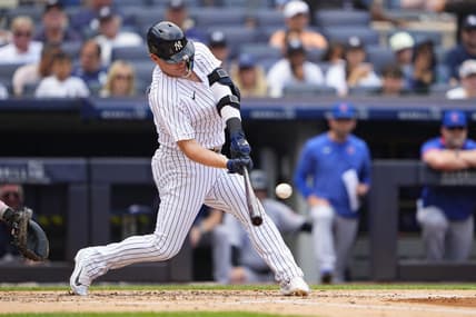 Jul 8, 2023; Bronx, New York, USA; New York Yankees designated hitter Josh Donaldson (28) hits a home run against the Chicago Cubs during the second inning at Yankee Stadium. Mandatory Credit: Gregory Fisher-USA TODAY Sports