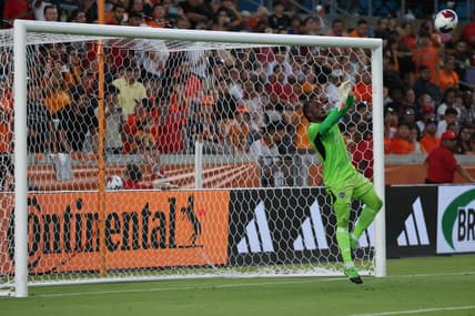 Jul 8, 2023; Houston, Texas, USA; Sporting Kansas City goalkeeper Kendall McIntosh (22) makes a save during the first half against the Houston Dynamo at Shell Energy Stadium. Mandatory Credit: Thomas Shea-USA TODAY Sports