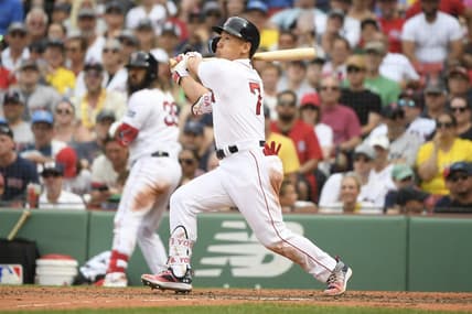 Jul 9, 2023; Boston, Massachusetts, USA;  Boston Red Sox designated hitter Masataka Yoshida (7) hits a home run during the eighth inning against the Oakland Athletics at Fenway Park. Mandatory Credit: Bob DeChiara-USA TODAY Sports