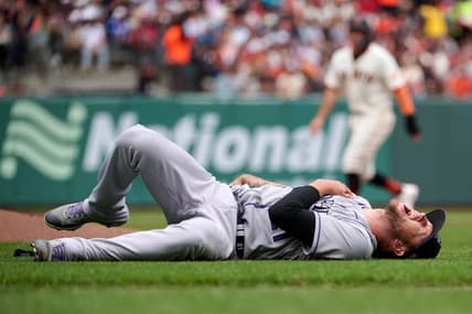 Jul 9, 2023; San Francisco, California, USA; Colorado Rockies pitcher Kyle Freeland (21) lies on field after injuring his right shoulder against the San Francisco Giants during the seventh inning at Oracle Park. Mandatory Credit: Robert Edwards-USA TODAY Sports