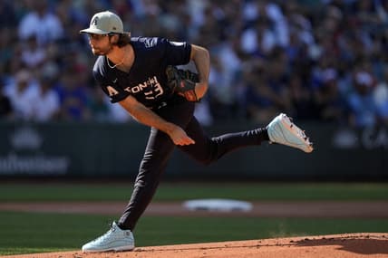 Jul 11, 2023; Seattle, Washington, USA; National League pitcher  Zac Gallen  of the Arizona Diamondbacks (23) throws a pitch against the American League during the first inning at T-Mobile Park. Mandatory Credit: Stephen Brashear-USA TODAY Sports