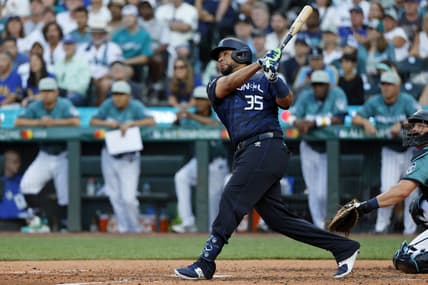 Jul 11, 2023; Seattle, Washington, USA; National League catcher Elias DIaz of the Colorado Rockies (35) hits a two-run home run against the American League during the eighth inning of the 2023 MLB All Star Game at T-Mobile Park. Mandatory Credit: Joe Nicholson-USA TODAY Sports