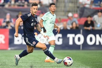 oJul 12, 2023; Foxborough, Massachusetts, USA; New England Revolution forward Giacomo Vrioni (9) passes the ball against the Atlanta United during the first half at Gillette Stadium. Mandatory Credit: Brian Fluharty-USA TODAY Sports