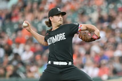 Jul 14, 2023; Baltimore, Maryland, USA;  Baltimore Orioles starting pitcher Dean Kremer (64) delivers a first inning pitch against the Miami Marlins at Oriole Park at Camden Yards. Mandatory Credit: Tommy Gilligan-USA TODAY Sports