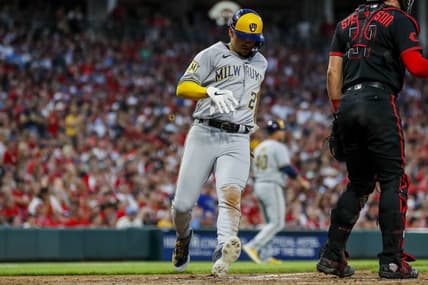 Jul 14, 2023; Cincinnati, Ohio, USA; Milwaukee Brewers shortstop Willy Adames (27) scores on a RBI single hit by catcher Victor Caratini (not pictured) in the seventh inning against the Cincinnati Reds at Great American Ball Park. Mandatory Credit: Katie Stratman-USA TODAY Sports