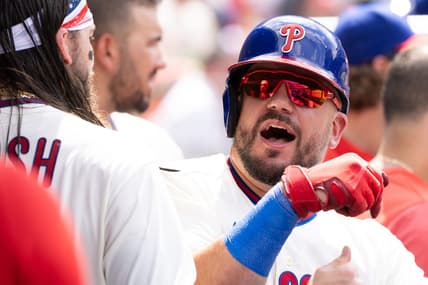 Jul 15, 2023; Philadelphia, Pennsylvania, USA; Philadelphia Phillies left fielder Kyle Schwarber (12) reacts with center fielder Brandon Marsh (16) after hitting a home run during the seventh inning against the San Diego Padres at Citizens Bank Park. Mandatory Credit: Bill Streicher-USA TODAY Sports