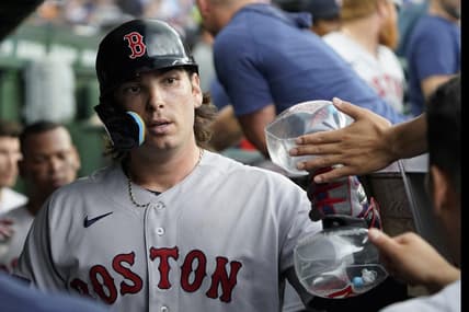 Jul 15, 2023; Chicago, Illinois, USA; Boston Red Sox first baseman Triston Casas (36) is greeted in the dugout after hitting a two-run home run against the Chicago Cubs during the seventh inning at Wrigley Field. Mandatory Credit: David Banks-USA TODAY Sports