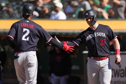 Jul 15, 2023; Oakland, California, USA; Minnesota Twins center fielder Michael A. Taylor (2) celebrates with catcher Ryan Jeffers (27) after hitting a home run against the Oakland Athletics during the third inning at Oakland-Alameda County Coliseum. Mandatory Credit: Darren Yamashita-USA TODAY Sports