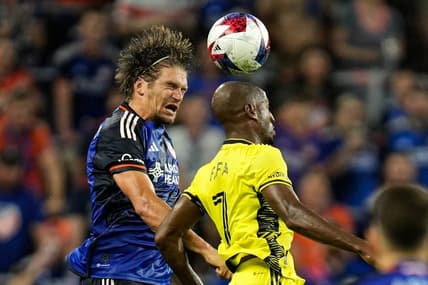 FC Cincinnati's Nick Hagglund leaps to head the ball during the first half of the FC Cincinnati vs. Nashville SC match at TQL Stadium on Saturday July 15, 2023. The game was tied 1-1 at halftime.
