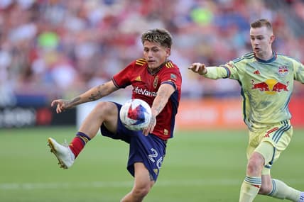 Jul 15, 2023; Sandy, Utah, USA; Real Salt Lake midfielder Diego Luna (26) and New York Red Bulls forward Cameron Harper (17) battle for control of a ball in the first half at America First Field. Mandatory Credit: Rob Gray-USA TODAY Sports