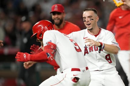 Jul 15, 2023; Anaheim, California, USA; Los Angeles Angels left fielder Taylor Ward (3) celebrates with shortstop Zach Neto (9) after hitting a fielder choice ground ball in the 10th inning to drive in the winning run against the Houston Astros at Angel Stadium. Mandatory Credit: Kirby Lee-USA TODAY Sports