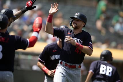 Jul 16, 2023; Oakland, California, USA; Minnesota Twins infielder Edouard Julien (47) celebrates scoring on a three-run double by Alex Kirilloff during the seventh inning against the Oakland Athletics at Oakland-Alameda County Coliseum. Mandatory Credit: D. Ross Cameron-USA TODAY Sports