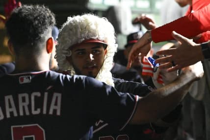 Jul 17, 2023; Chicago, Illinois, USA;  Washington Nationals catcher Keibert Ruiz (20) celebrates in the dugout after hitting a two-run home run against the Chicago Cubs during the seventh inning at Wrigley Field. Mandatory Credit: Matt Marton-USA TODAY Sports