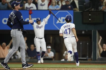 Jul 17, 2023; Arlington, Texas, USA; Texas Rangers shortstop Josh Smith (47) scores the winning run on a wild pitch in the ninth inning against the Tampa Bay Rays at Globe Life Field. Mandatory Credit: Tim Heitman-USA TODAY Sports