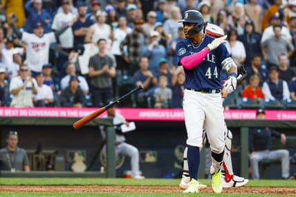 Jul 17, 2023; Seattle, Washington, USA; Seattle Mariners center fielder Julio Rodriguez (44) tosses his bat after drawing an RB-walk against the Minnesota Twins during the fifth inning at T-Mobile Park. Mandatory Credit: Joe Nicholson-USA TODAY Sports