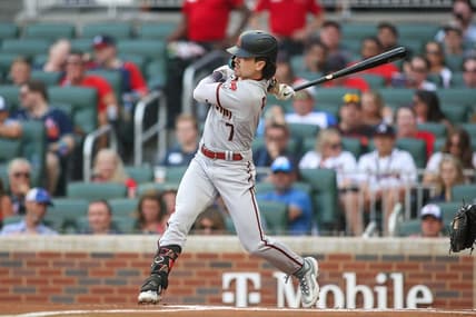 Jul 18, 2023; Atlanta, Georgia, USA; Arizona Diamondbacks right fielder Corbin Carroll (7) hits a RBI triple against the Atlanta Braves in the first inning at Truist Park. Mandatory Credit: Brett Davis-USA TODAY Sports