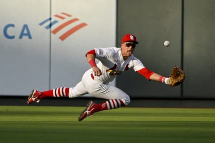 Jul 18, 2023; St. Louis, Missouri, USA;  St. Louis Cardinals center fielder Lars Nootbaar (21) dives and catches a line drive hit by Miami Marlins center fielder Dane Myers (not pictured) during the second inning at Busch Stadium. Mandatory Credit: Jeff Curry-USA TODAY Sports