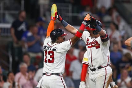 Jul 18, 2023; Atlanta, Georgia, USA; Atlanta Braves third baseman Austin Riley (27) celebrates after a two-run home run with right fielder Ronald Acuna Jr. (13) against the Arizona Diamondbacks in the sixth inning at Truist Park. Mandatory Credit: Brett Davis-USA TODAY Sports