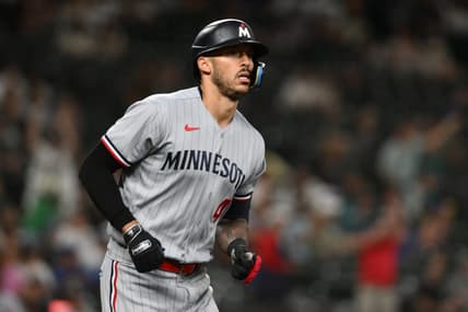 Jul 18, 2023; Seattle, Washington, USA; Minnesota Twins shortstop Carlos Correa (4) runs toward first base after hitting a home run against the Seattle Mariners during the ninth inning at T-Mobile Park. Mandatory Credit: Steven Bisig-USA TODAY Sports