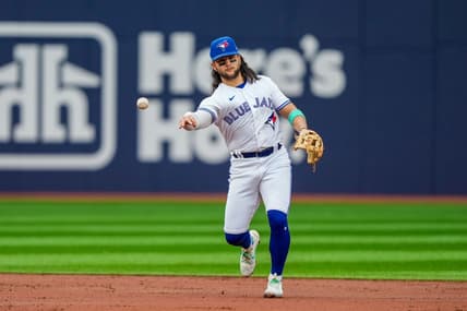 Jul 14, 2023; Toronto, Ontario, CAN; Toronto Blue Jays shortstop Bo Bichette (11) throws to first against the Arizona Diamondbacks  at Rogers Centre. Mandatory Credit: Kevin Sousa-USA TODAY Sports