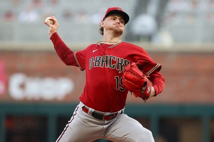 Jul 19, 2023; Atlanta, Georgia, USA; Arizona Diamondbacks starting pitcher Ryne Nelson (19) throws against the Atlanta Braves in the first inning at Truist Park. Mandatory Credit: Brett Davis-USA TODAY Sports