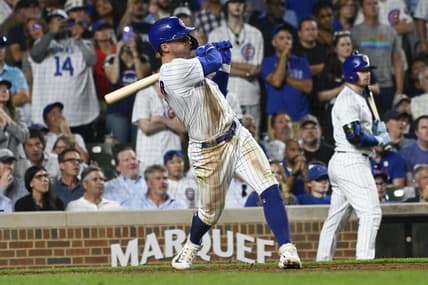 Jul 19, 2023; Chicago, Illinois, USA;  Chicago Cubs second baseman Nico Hoerner (2) his a grand slam against the Washington Nationals during the eighth inning at Wrigley Field. Mandatory Credit: Matt Marton-USA TODAY Sports