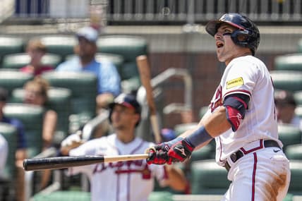 Jul 20, 2023; Cumberland, Georgia, USA; Atlanta Braves third baseman Austin Riley (27) reacts after hitting a home run against the Arizona Diamondbacks during the eighth inning at Truist Park. Mandatory Credit: Dale Zanine-USA TODAY Sports