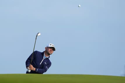 July 20, 2023; Hoylake, England, GBR; Brian Harman plays a shot onto the 17th green during the first round of The Open Championship golf tournament at Royal Liverpool. Mandatory Credit: Kyle Terada-USA TODAY Sports